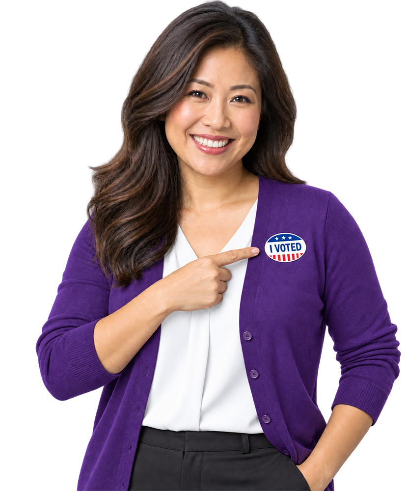 MomVote - Smiling mom pointing to her I Voted sticker