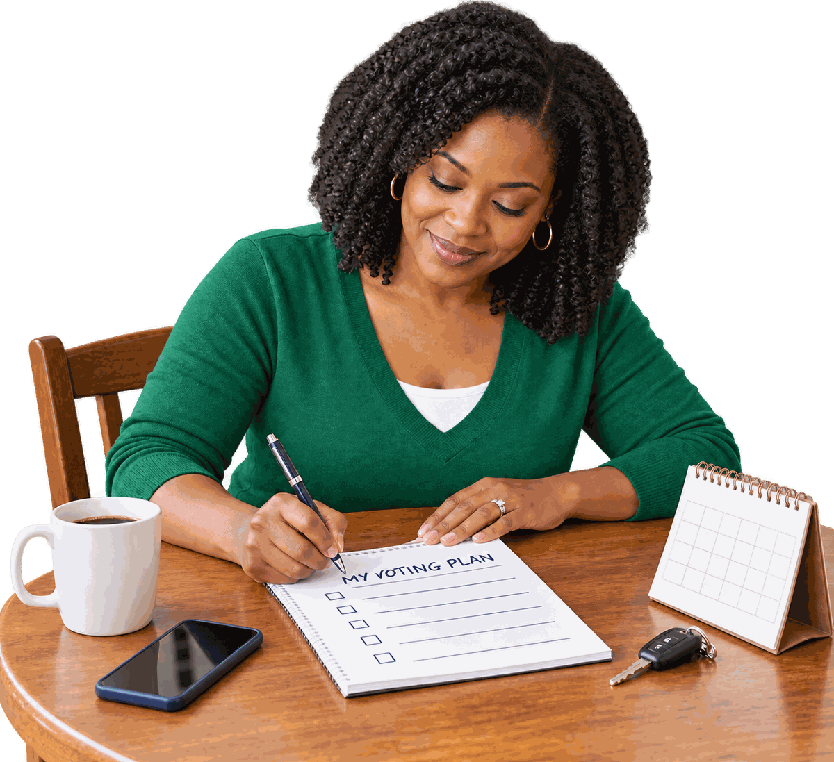MomVote - Mom writing out her voting plan at the kitchen table